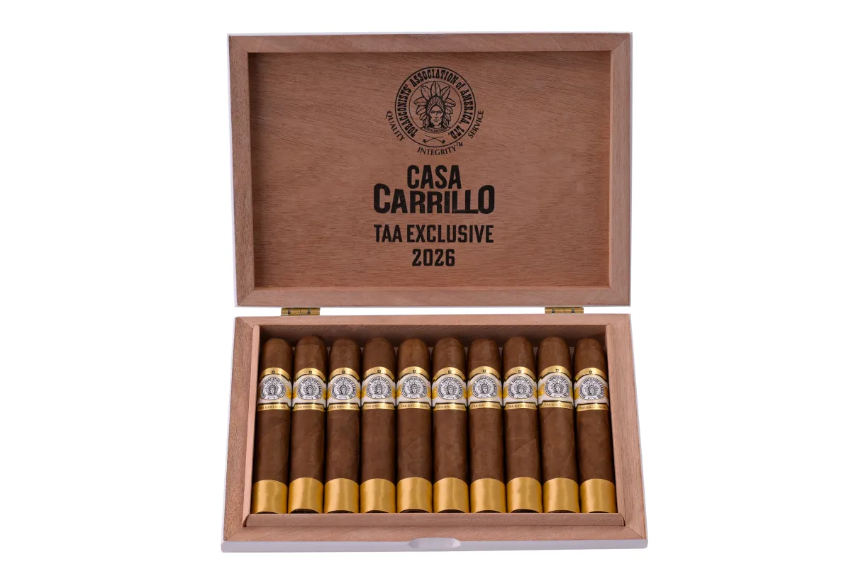 Open box of ten Casa Carrillo 2026 TAA Exclusive cigars with gold-capped feet, lid stamped Casa Carrillo TAA Exclusive 2026