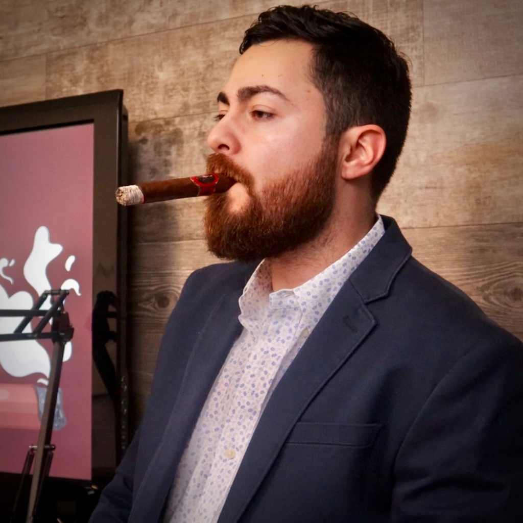 Alex smoking the Besa cigar