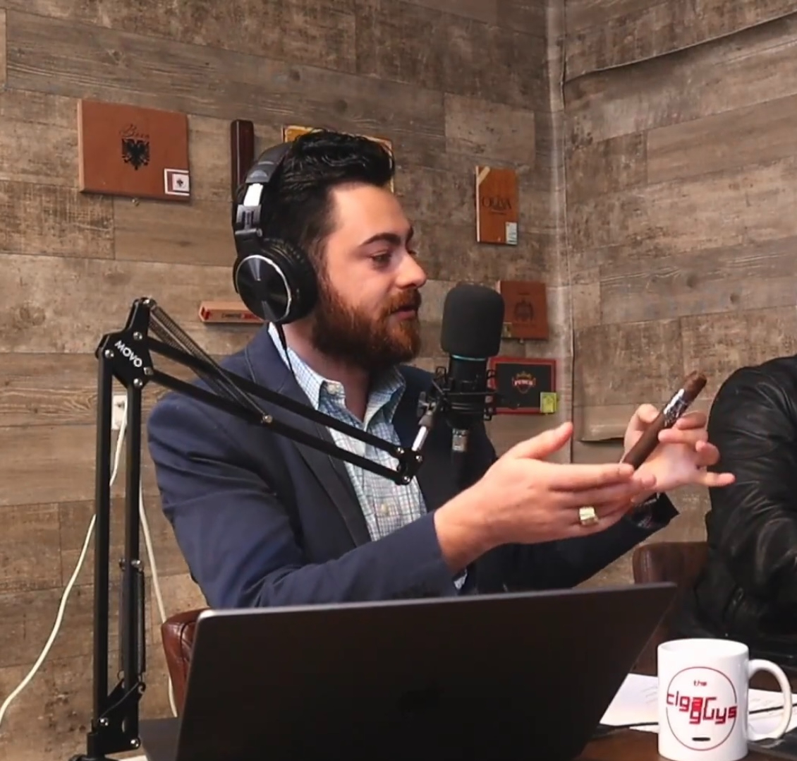 Alex smoking the Army of Angels cigar