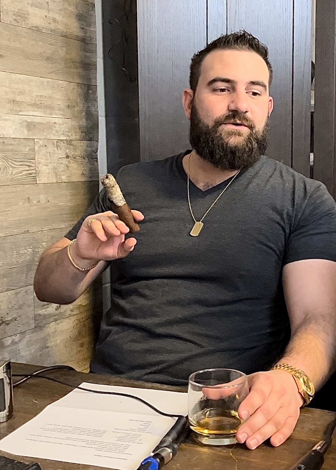 Jared smoking a cigar