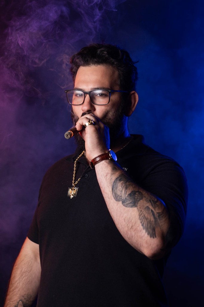 Mark Nikollaj Smoking a cigar