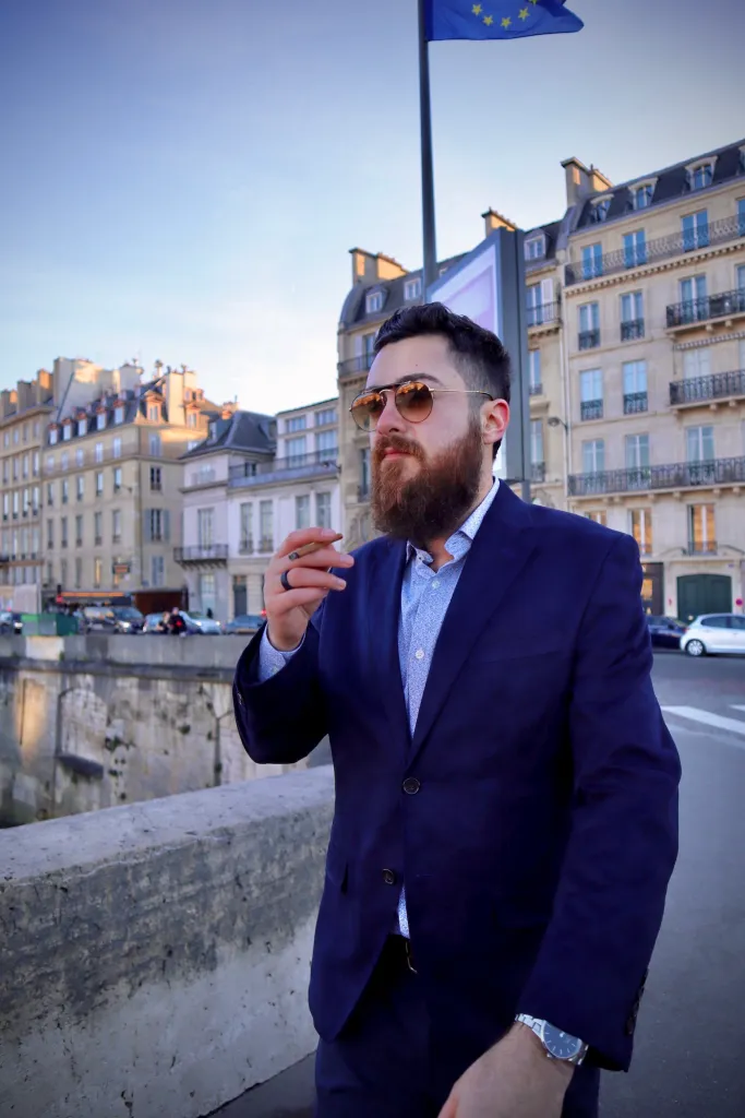 Alexander J Gonzalez smoking cigarillo